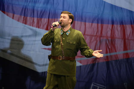 Concert Hall "Cosmos", Moscow, Russia - 11.17.2018: International competition-festival of creative teams "Energy of Creativity" and "Steps of Mastery" .A man sings on stage.のeditorial素材