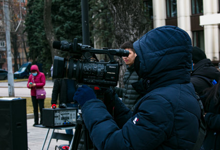 Dnepropetrovsk, Ukraine - 03.19.2021: Journalists work at a rally of entrepreneurs to protest the...