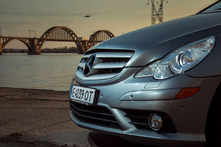 Dnepropetrovsk, Ukraine - 03.15.2021: Car Mercedes-Benz R 350. Radiator grill with Mercedes icon on...