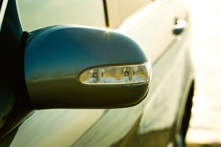 Dnepropetrovsk, Ukraine - 03.15.2021: Left side mirror of the car Mercedes-Benz R 350. Close-up.のeditorial素材