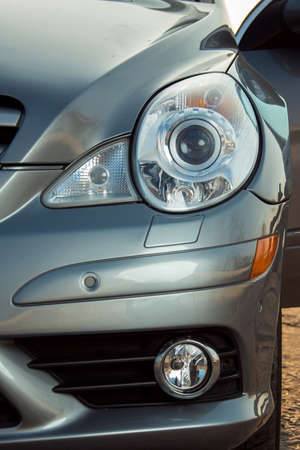 Dnepropetrovsk, Ukraine - 03.15.2021: Left front headlight of the car Mercedes-Benz R 350. Close-up.