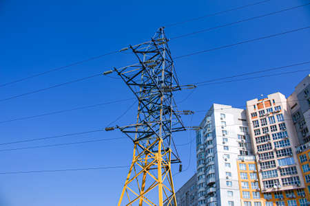 Power lines. High voltage power line against the blue sky.