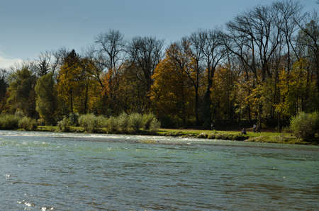 Isar river near Munich. A favorite resting place for the townspeople. Bavaria, Germany.