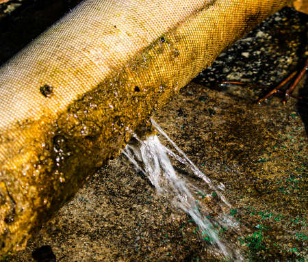 Leakage in the connection of the water pumping pipes. Breakthrough of the water pump sleeve.