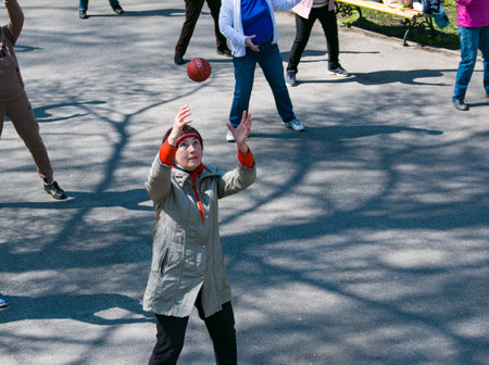 Dnepropetrovsk, Ukraine - 04.22.2021: A group of elderly people doing health and fitness gymnastics...