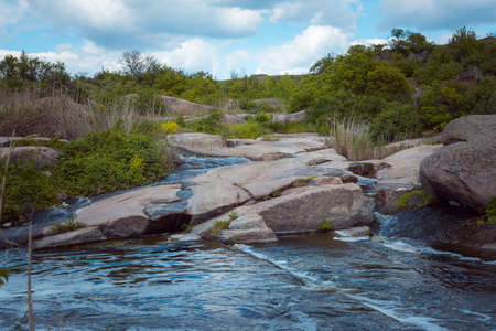 The murmuring waters of the Tokovsky waterfall in Ukraine. This is the only steppe waterfall in the world.の写真素材