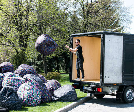 Dnepropetrovsk, Ukraine - 05/01/2021: preparing the summer cafe for the season. Unloading soft...