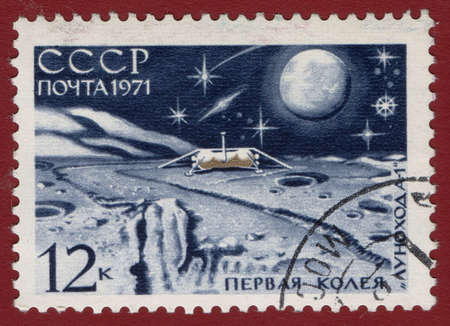 USSR - CIRCA 1971: A Stamp printed in the USSR shows the first track of a moon rover - 1, circa 1971のeditorial素材