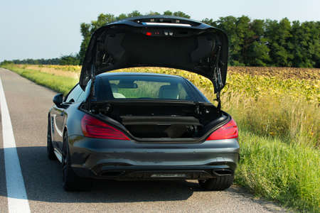 Dnepropetrovsk, Ukraine - 08.24.2021: Photos of Mercedes Benz SL550 convertible on the road. Details...