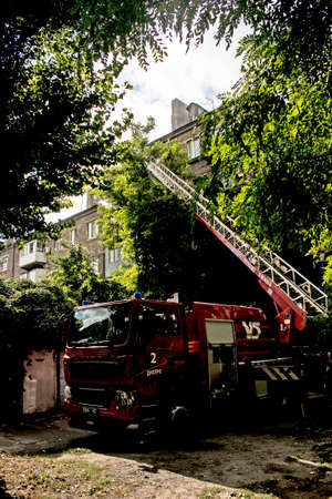 Dnepropetrovsk, Ukraine -09.20.2021: Fire in a residential five-story building. Fire escape with a...