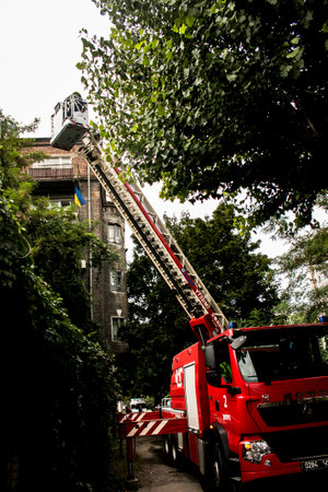 Dnepropetrovsk, Ukraine -09.20.2021: Fire in a residential five-story building. Fire escape with a...