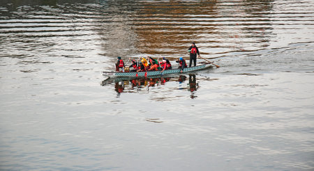 Dnepropetrovsk, Ukraine - 10.16.2021: Young people train in the practice of canoeing on the Dnieper...