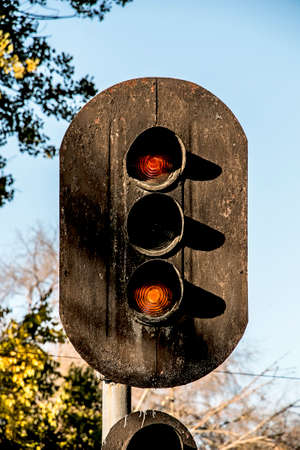 Traffic light shows red signal on railway. Red lightの写真素材
