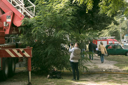 Dnepropetrovsk, Ukraine -09.20.2021: A local newspaper correspondent is filming a report on the...