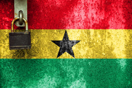 Ghana flag on texture. Sample. virus pandemic. Countries may be closed. Locks.の写真素材