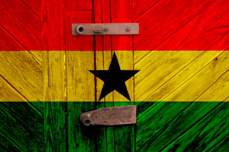 Ghana flag on texture. Sample. virus pandemic. Countries may be closed. Locks.の写真素材