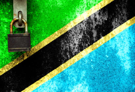 Tanzania flag on texture. Sample.virus pandemic. The countries are closed. Locks.の写真素材