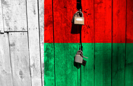 Madagascar flag on texture. Sample.virus pandemic. The countries are closed. Locks.の写真素材