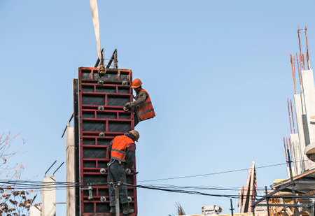 Dnepropetrovsk, Ukraine - 10.25.2021: Preparation and assembly of formwork for reinforced concrete...