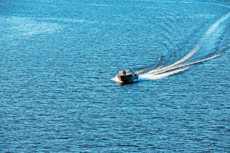 Dnepropetrovsk, Ukraine - 10.31.2021: Motor boat on the river, autumn.のeditorial素材
