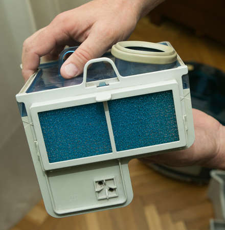 Close-up of a clean filter diffuser of a wet cleaning vacuum cleaner. Installing the filter before cleaning.の写真素材