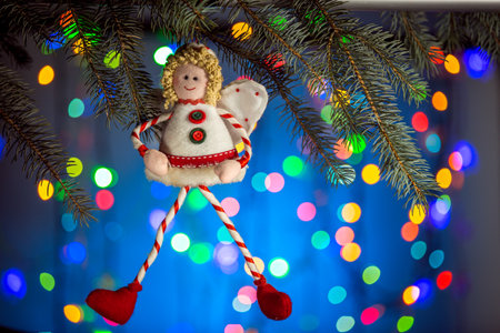 Christmas toy on sparkling and fabulous bokeh background with copy space. Christmas background for postcards. Christmas decoration concept.の写真素材