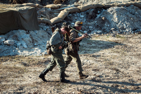 Dnepr, Ukraine - 10.29.2013: Military enactment show of WW2 period with tanks, aircraft, vehicles and people in period costume and uniform. Restoration of the Battle for the liberation of Dneprのeditorial素材