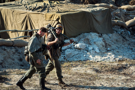 Dnepr, Ukraine - 10.29.2013: Military enactment show of WW2 period with tanks, aircraft, vehicles and people in period costume and uniform. Restoration of the Battle for the liberation of Dneprのeditorial素材