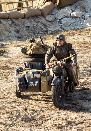 Dnepr, Ukraine - 10.29.2013: Military enactment show of WW2 period with tanks, aircraft, vehicles and people in period costume and uniform. Restoration of the Battle for the liberation of Dneprのeditorial素材
