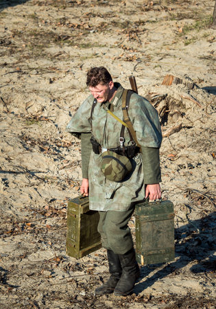 Dnepr, Ukraine - 10.29.2013: Military enactment show of WW2 period with tanks, aircraft, vehicles and people in period costume and uniform. Restoration of the Battle for the liberation of Dneprのeditorial素材