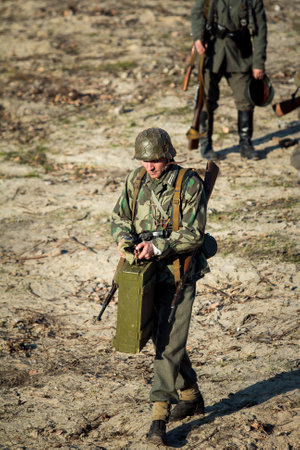 Dnepr, Ukraine - 10.29.2013: Military enactment show of WW2 period with tanks, aircraft, vehicles and people in period costume and uniform. Restoration of the Battle for the liberation of Dneprのeditorial素材