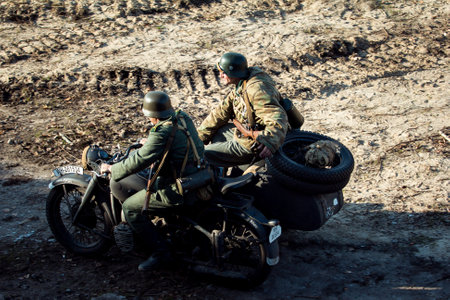 Dnepr, Ukraine - 10.29.2013: Military enactment show of WW2 period with tanks, aircraft, vehicles and people in period costume and uniform. Restoration of the Battle for the liberation of Dneprのeditorial素材