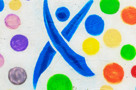texture of paint brush strokes of different colors on the wallの写真素材