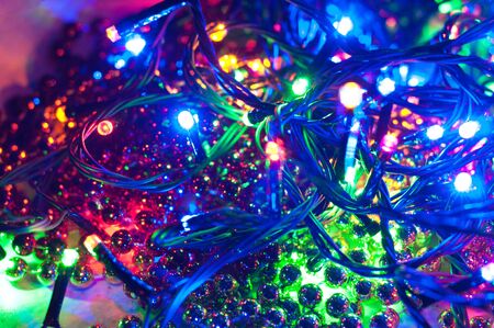 Christmas background, garland lights and beads. Christmas decorations. New Year.の写真素材