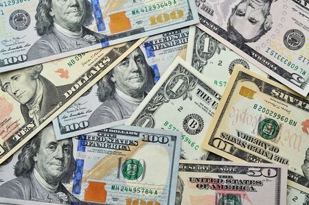 Money close-up. Texture US dollars. Background of dollar bills.