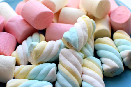 Multi-colored marshmallows. Background or texture of colorful pink and blue marshmallows.の写真素材