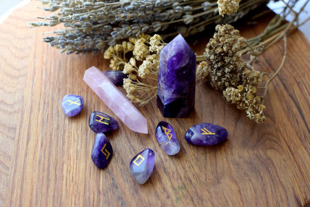 Scandinavian runes made of amethysts, semi-precious stone crystals and dry herbs. Predictions,...
