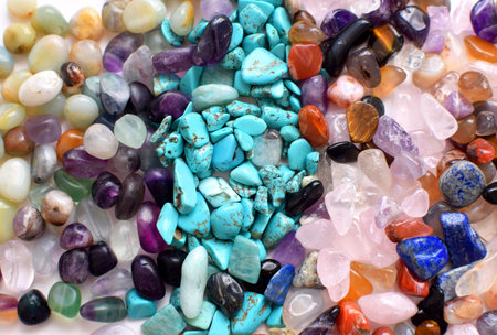 The background is made of beautiful natural colored semi-precious stones. Fluorite, turquoise and...