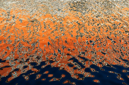 abstract background texture arises from the reflection on the waterの写真素材