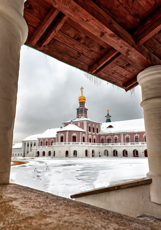 Art the new Jerusalem monastery Istra, Russia wall and the road to the bell tower in winter