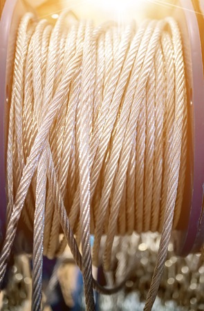 Thick steel braided cable at the Babyn closeup selective focus. Tinted glass.の写真素材
