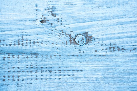 Blue abstract painted background with texture of the Board.の写真素材