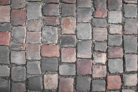 Background of old European cobblestones.の写真素材