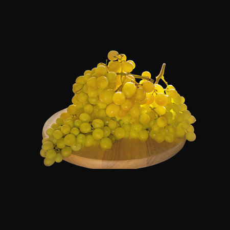 Beautiful large bunch of white grapes lying on a round Board. Isolated on a black background. Copy space.の写真素材