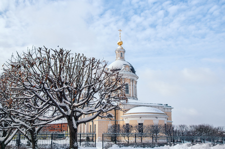 Kolomna Church of the Archangel Michael with a bell tower at dawn with beautiful clouds and Golden light of late autumn in the snow. Horizontal frameの写真素材
