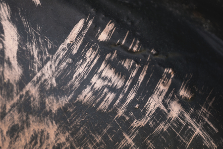 Gold metal texture background with wrought-iron picture is not in focus. Close-up. The horizontal frame.の写真素材