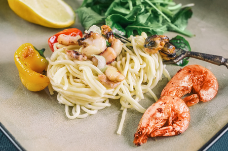 GarlickySeafood pasta Spaghetti with Clams, Prawns, Seafood Cocktail close up prawn pasta.の写真素材