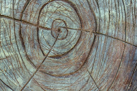 Close-up of a carved stone artifact. Exclusive texture. Concrete carving. Manual work. Imitation of...