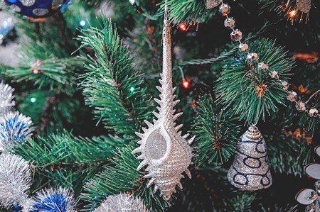 Beautiful Christmas decorations hanging on a Christmas tree. Home decoration for Christmas.の写真素材
