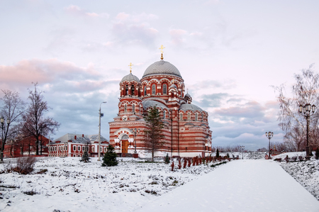Russia Kolomna the ancient temple of the Holy Trinity at sunset in winterの写真素材